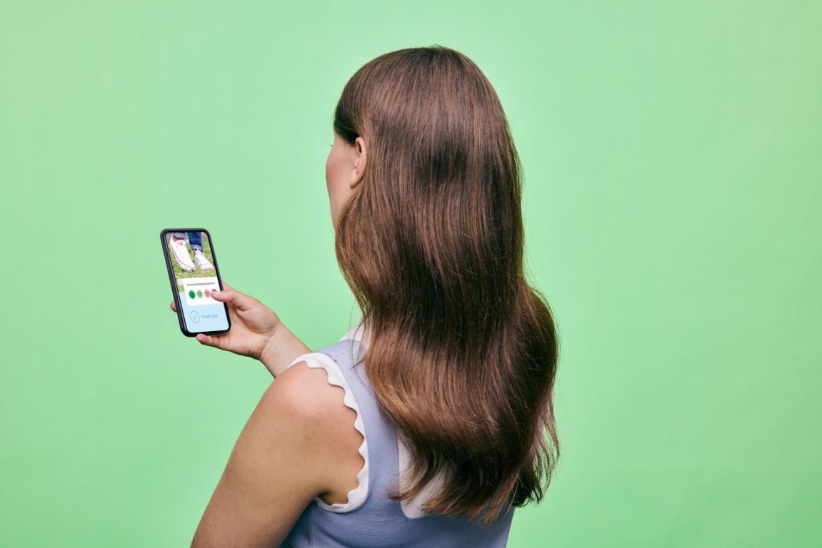 Woman giving online feedback with Smiley Digital